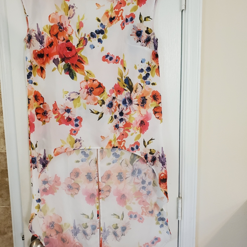 Sweat Pea New York and Company top